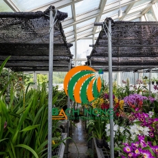 Nên chọn lưới lan hay lưới dệt kim để che nắng cho hoa lan?